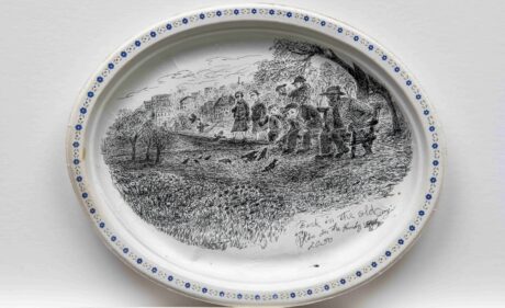 A pen and ink drawing by Harold Cromwell on a Chinet plate