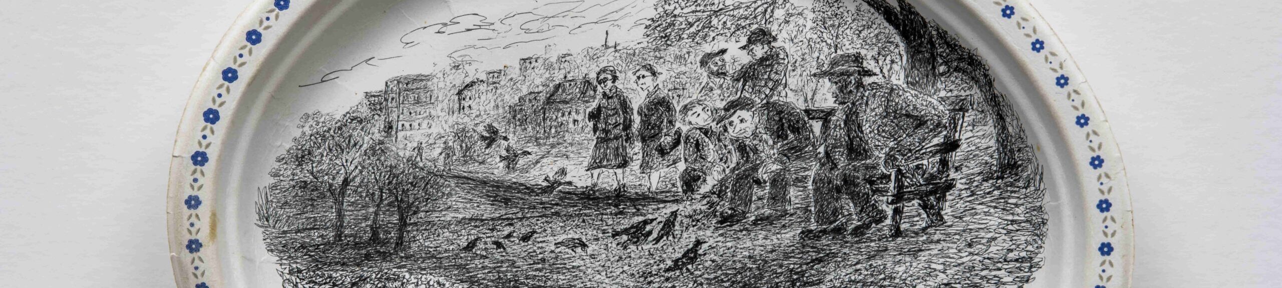 A pen and ink drawing by Harold Cromwell on a Chinet plate