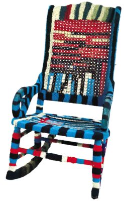 A rocking chair crocheted with various fabrics