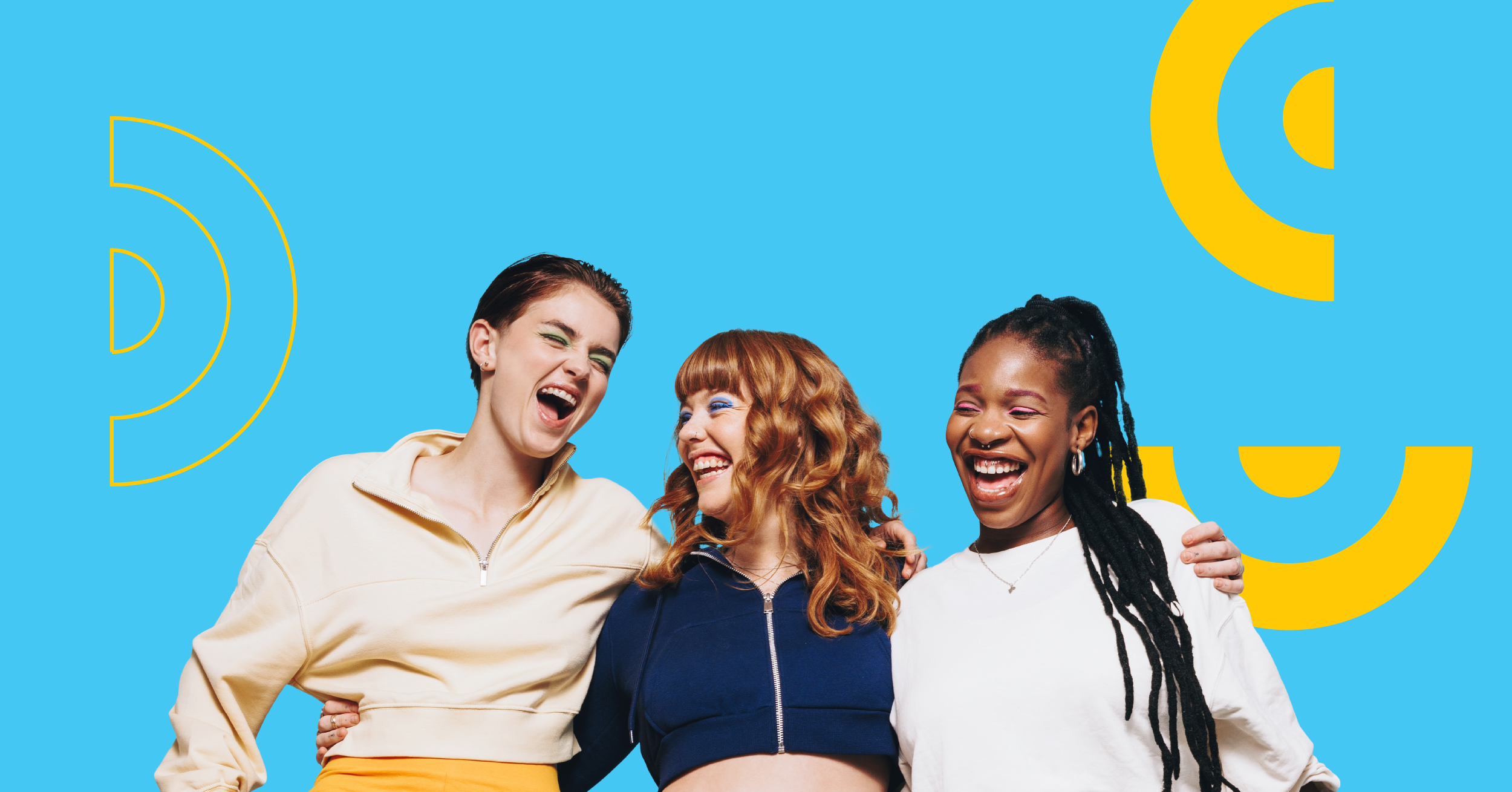 Three young women against a blue background with yellow graphics