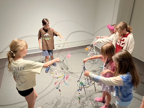 Children participate in art-making activities
