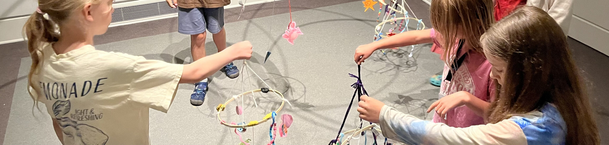 Children play with art projects